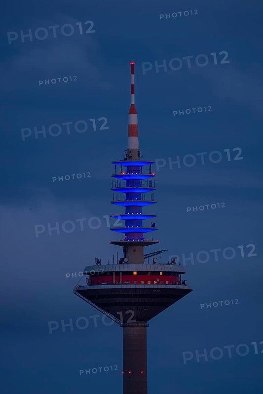 The top of the Europe Tower in Frankfurt am Main shines in the blue of the European Union (EU) until the European elections on 9 June 2024 ., Frankfurt am Main, Hesse, Germany, Europe
