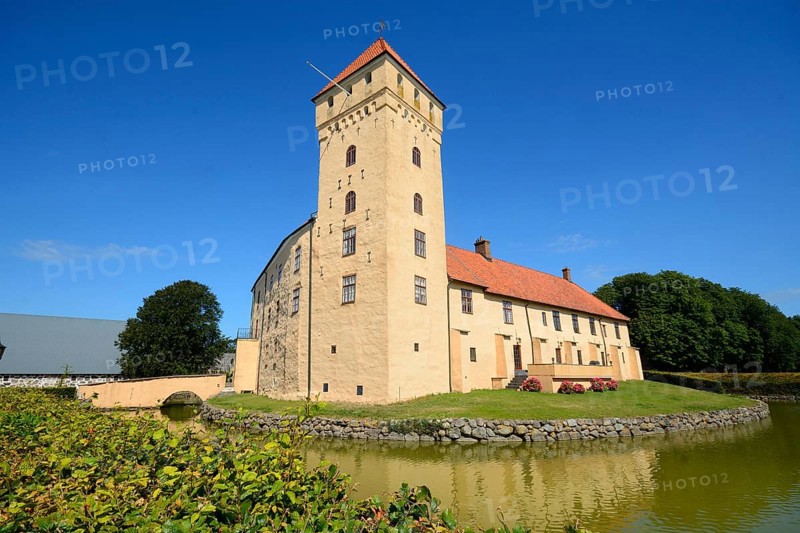 Tosterup castle against blue sky in Tomelilla Municipality, Skane County, Sweden, Scandinavia, Europe