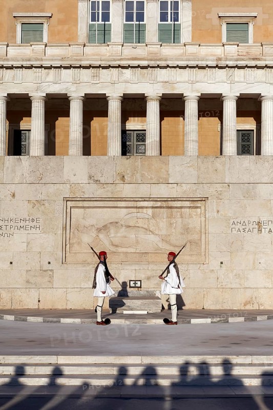 Two Evzones in traditional dress in front of the parliament building, Tomb of the Unknown Soldier, Syntagma Square, Athens, Greece, Europe