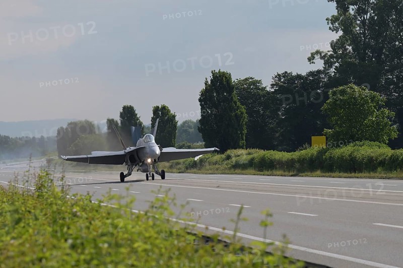 Swiss Air Force F/A 18 fighter aircraft take off and land on the A1 motorway during the Alpha Uno exercise in Payerne on Wednesday, 5 June 2024. The purpose of the military exercise is to strengthen the defence capability of the Swiss Armed Forces through so-called decentralisation. (DDPS/DDPS, Sam Bosshard)