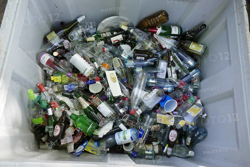 Waste glass, glass waste in a waste paper basket, Germany, Europe