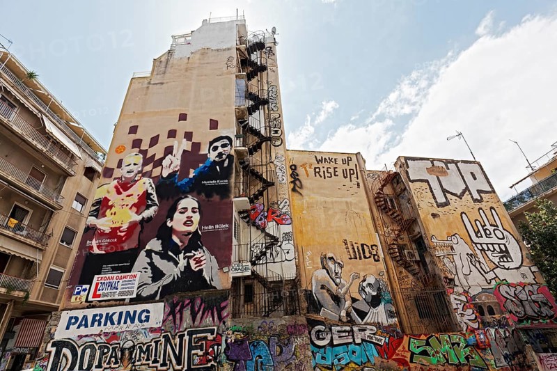 Graffiti-painted house walls, portraits of three Turkish activists who died on hunger strike, street art in Exarchia, student and alternative neighbourhood, Athens, Greece, Europe