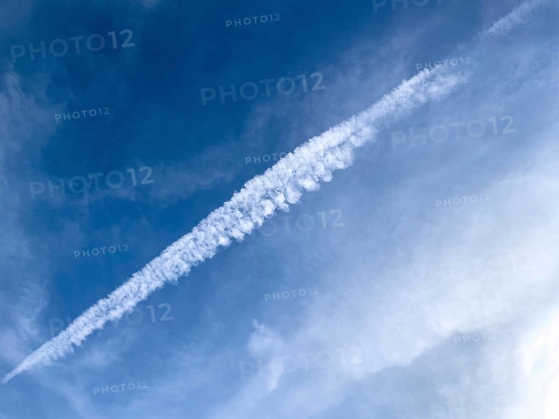 Dissipating contrail high thin cloud artificially created by aircraft engines homomutatus man-made with by jet aircraft jet aircraft jet aircraft jet turbines of passenger aircraft mistakenly chem-trails chem-trails, international