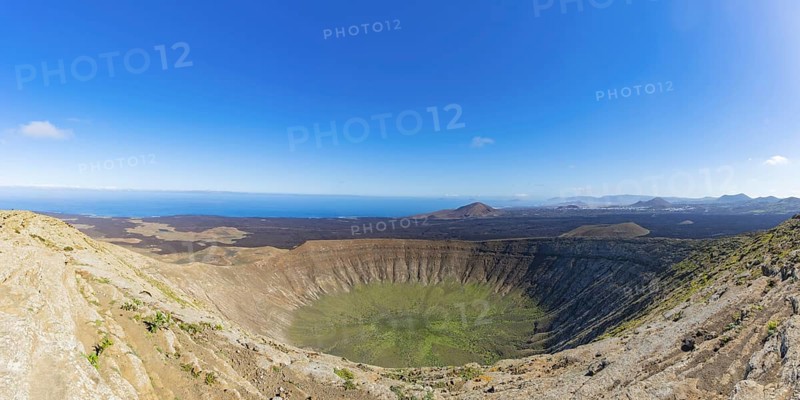 Panorama from the crater rim into the crater of Caldera Blanca, Parque Natural de Los Volcanes, Lanzarote, Canary Islands, Spain, Europe
