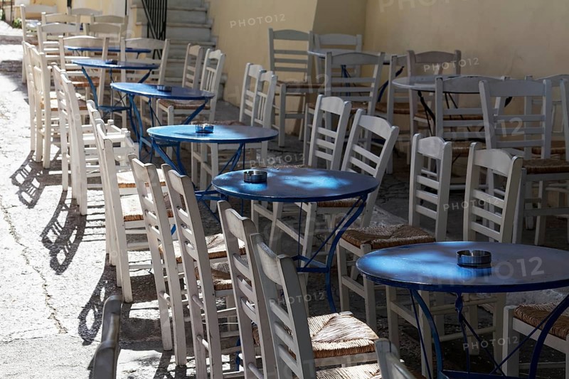 Row of blue tables and white chairs, taverna in the historic centre of Plaka, Athens, Greece, Europe
