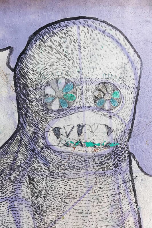Creepy creature with sharp teeth, ghost figure, street art in the Anafiotika neighbourhood, Athens, Greece, Europe