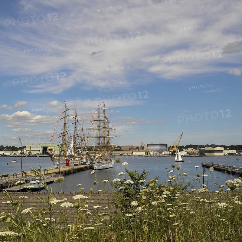 The United States Coast Guard tall ship Eagle and the Brazilian Navy tall ship Cisne Branco, which means White Swan, seen here moored at Fort Trumbull in New London, Connecticut, USA during Operation Sail 2012 aka OpSail 2012, celebrating the bicentennial of the War of 1812 and the penning of the Star Spangled Banner, the US National Anthem. Both tall ships are Class A square-riggers and both act as international envoys for their respective countries and as training vessels (the Eagle for US Coast Guard cadets and the Cisne Branco for the Brazilian navy)