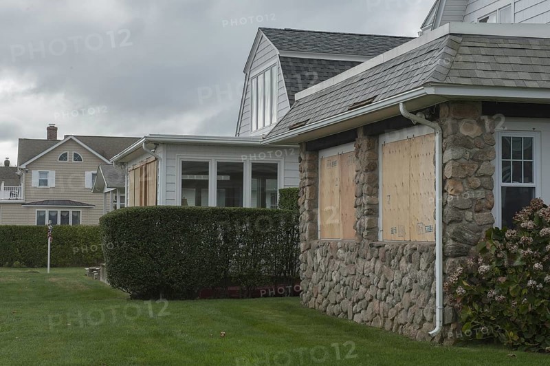 Homes along the Connecticut USA shoreline with windows boarded up for protection against Hurricane Sandy. Black Point, Niantic, CT USA