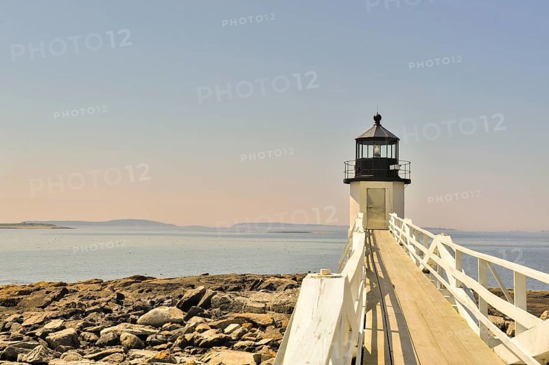 Marshall Point Lighthouse on Penobscot Bay, Port Clyde Maine USA on the Saint George Peninsula at twilight with copy space