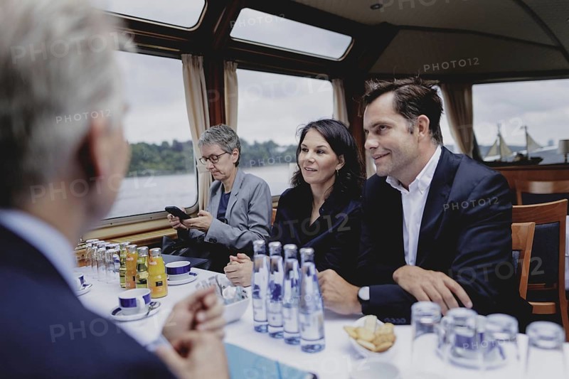 Annalena Bärbock (Bündnis 90/Die Grünen), Federal Foreign Minister, and Johannes Berg, Director Corporate Affairs at HHLA, on a boat trip through the Port of Hamburg on the barge 'Diplomat' during the Foreign Minister's trip to Germany in Hamburg, 26 July 2024. /