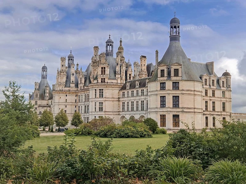 Chateau de Chambord a majestic medieval castle with green gardens. Beautiful palace in the region of Loire, France, Europe