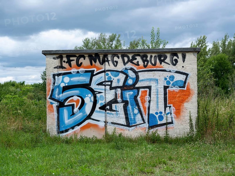 Graffiti 1. FC Magdeburg since 1965 on a wall at Jersleber See. In the European Cup, 1. FC Magdeburg reached the quarter-finals in the 1965-66 season after an 8:1 victory over FC Sion on 17 November 1965, the highest victory in its European Cup history., Jersleben, Saxony-Anhalt, Germany, Europe