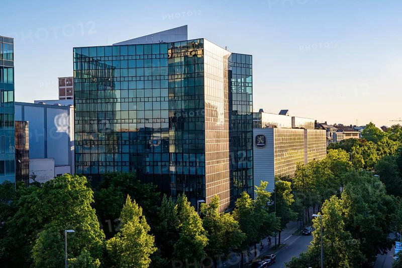 Modern office building, Löwenbräu brewery building in the evening light, Stiglmaierplatz, Munich, Upper Bavaria, Bavaria, Germany, Europe