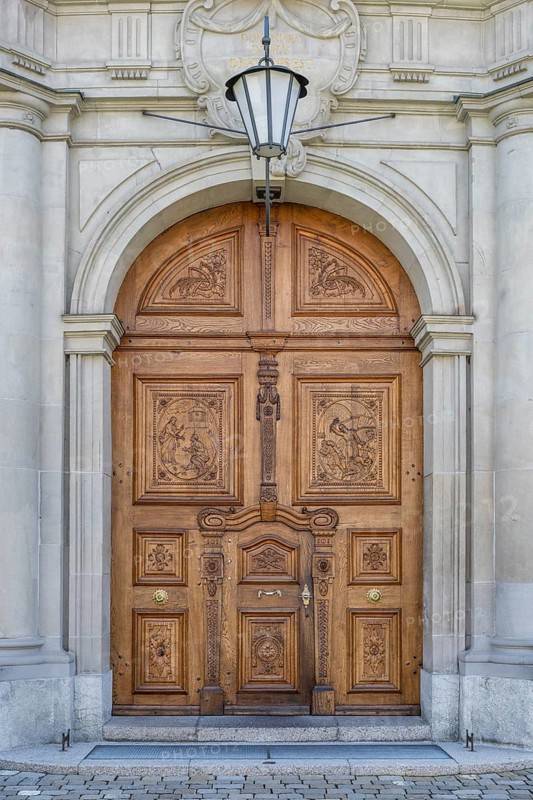 Artfully decorated wooden portal of the collegiate church, St. Gallen Cathedral, UNESCO World Heritage Site, monastery quarter, old town of St. Gallen, Canton of St. Gallen, Switzerland, Europe