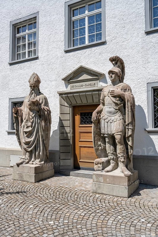 Entrance to St Gall's Chapel, flanked by larger-than-life stone statues of Desiderius of Vienne and St Maurice, monastery quarter, old town of Sankt Gallen, Canton of St Gallen, Switzerland, Europe