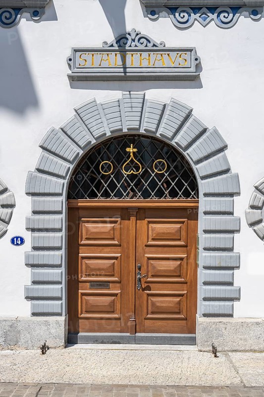 Archway with wooden door on the historic town house, Gallusstrasse, monastery quarter, old town of Sankt Gallen, Canton of St. Gallen, Switzerland, Europe