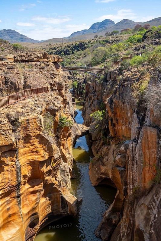 Bridge over a canyon with steep orange-coloured cliffs and the Blyde River, Bourke's Luck Potholes, Panorama Route, Mpumalanga, South Africa, Africa