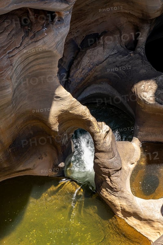 Water flowing through eroded rock formations, canyon with steep orange-coloured rock cliffs with the Blyde River, Bourke's Luck Potholes, Panorama Route, Mpumalanga, South Africa, Africa