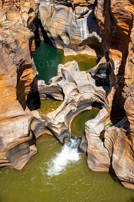 Eroded rock formations, canyon with steep orange-coloured rock cliffs with the Blyde River, Bourke's Luck Potholes, Panorama Route, Mpumalanga, South Africa, Africa