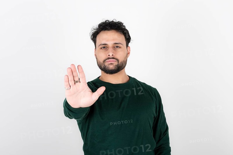 Man saying no with her hand. Stop concept