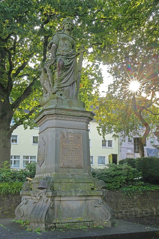 War memorial with statue of Germania against the light, Fissmer-Anlage, Siegen, Siegerland, North Rhine-Westphalia, Germany, Europe