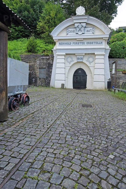Reinhold Forster ore adit built in 1859, portal, decorations, inscription, luck, on, year, 1805, symbol, mallet and iron, entrance, iron mine, mine, lorry, ore adit, mining, lure, Eiserfeld, Siegen, Siegerland, North Rhine-Westphalia, Germany, Europe