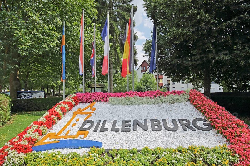 Colourful flower bed with flags, floral decoration and inscription, Dillenburg, Hesse, Germany, Europe