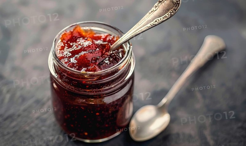 Homemade apple jam in a mason jar AI generated