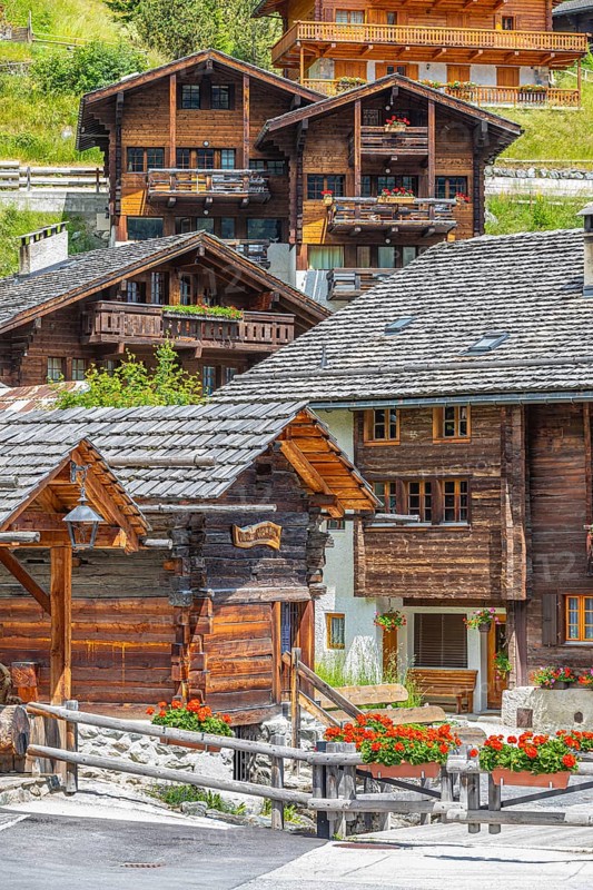 Old wooden houses with wooden shingle roofs in the historic centre of Grimentz, Val d'Anniviers, Valais Alps, Canton Valais, Switzerland, Europe