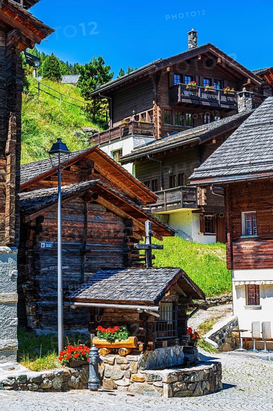 Old wooden houses with wooden shingle roofs and flower boxes in the historic centre of Grimentz, Val d'Anniviers, Valais Alps, Canton Valais, Switzerland, Europe