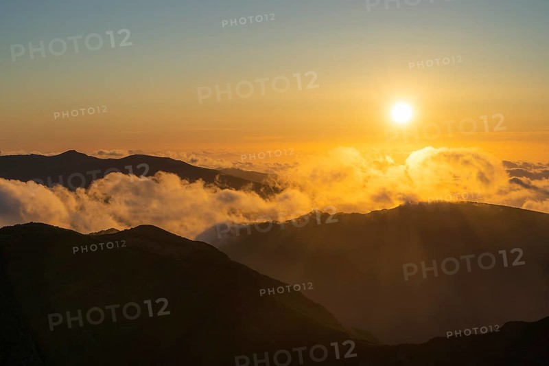 Pico Ruivo. Mountain Peaks at Sunset. Cloud Inversion. Golden Hour. Madeira, Portugal, Europe