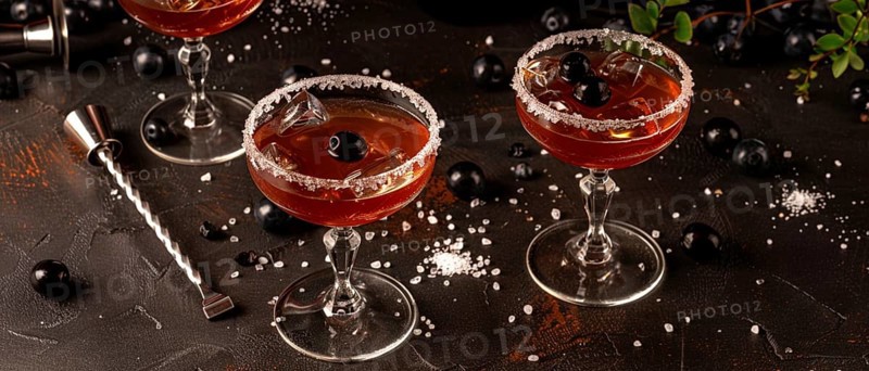 Sophisticated cocktail glasses with blueberries and sugar rims on an elegant dark background, AI generated