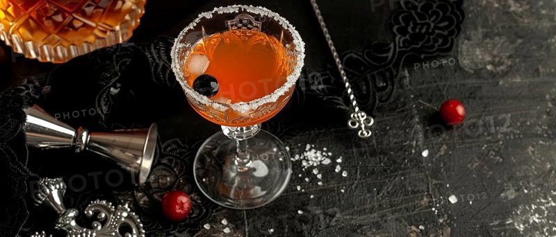 Vintage-style cocktail with a sugar rim and cherries, set against a dark, elegant background, AI generated