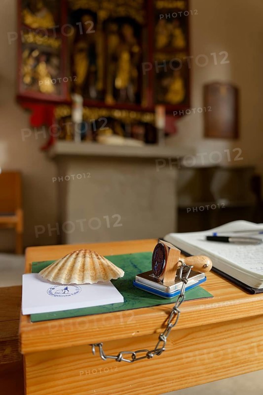 Pilgrim's stamp and pilgrim's guest book in the Wolfgangskirche, rose garden-Tullau, Tullau, scallop shell, Way of St James, pilgrimage, Kocher valley, Kocher, Schwäbisch Hall, Hohenlohe, Heilbronn-Franken, Baden-Württemberg, Germany, Europe