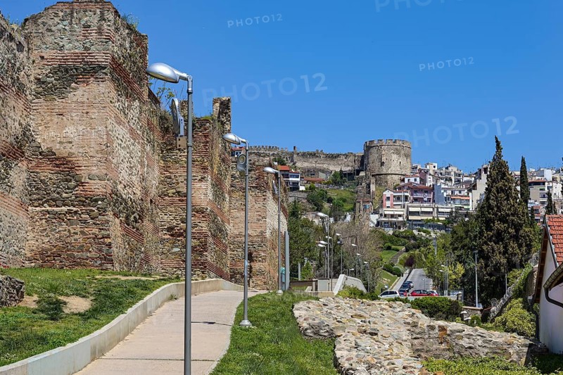 Footpath along the Byzantine city wall up to the historical Fortress of Thessaloniki in Macedonia, Greece, landmark and famous tourist destination, blue sky on a sunny day, copy space, Europe