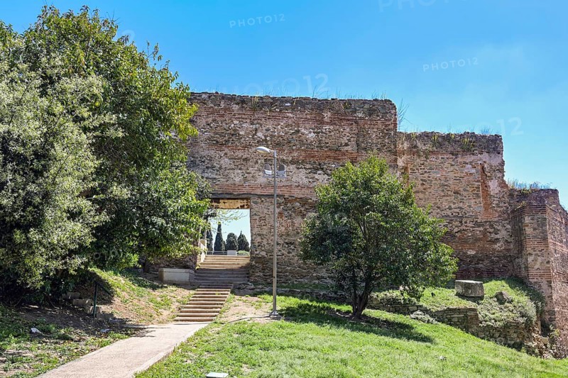 Gateway through the Byzantine city wall in Thessaloniki, Macedonia, Greece, historic monument, landmark and famous tourist destination, blue sky on a sunny day, copy space, Europe