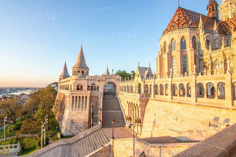 Old historic fortress and church at sunrise. City panorama at dusk. View of the Danube Fishermen's Bastion, Halaszbastya, Budapest, Hungary, Europe