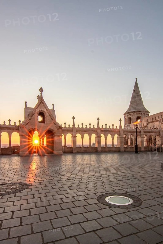 Old historic fortress and church at sunrise. City panorama at dusk. View of the Danube Fishermen's Bastion, Halaszbastya, Budapest, Hungary, Europe
