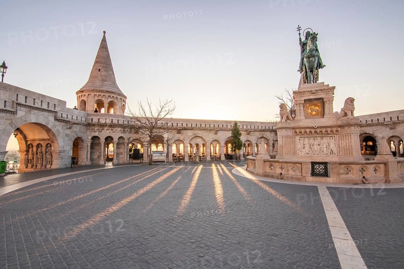 Old historic fortress and church at sunrise. City panorama at dusk. View of the Danube Fishermen's Bastion, Halaszbastya, Budapest, Hungary, Europe