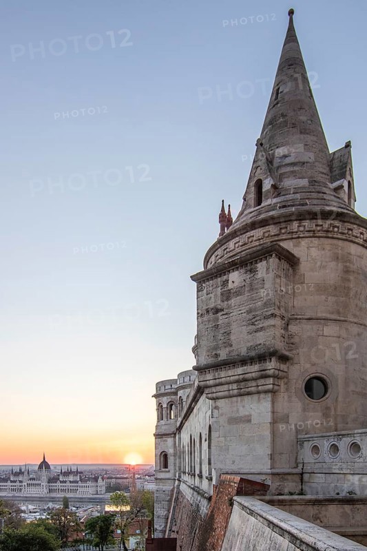 Old historic fortress and church at sunrise. City panorama at dusk. View of the Danube Fishermen's Bastion, Halaszbastya, Budapest, Hungary, Europe