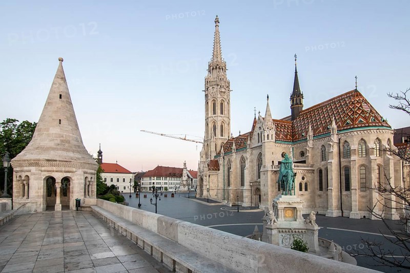 Old historic fortress and church at sunrise. City panorama at dusk. View of the Danube Fishermen's Bastion, Halaszbastya, Budapest, Hungary, Europe
