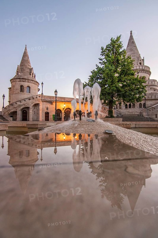 Old historic fortress and church at sunrise. City panorama at dusk. View of the Danube Fishermen's Bastion, Halaszbastya, Budapest, Hungary, Europe