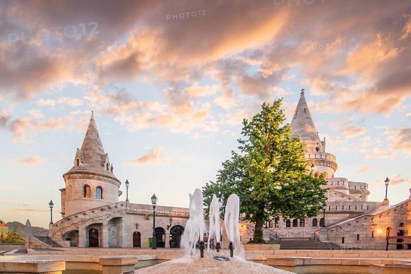 Old historic fortress and church at sunrise. City panorama at dusk. View of the Danube Fishermen's Bastion, Halaszbastya, Budapest, Hungary, Europe