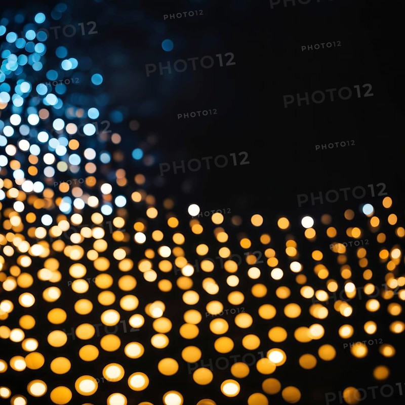 Abstract bokeh effect combining warm-colored and blue lights creating a glowing and patterned appearance against a dark background, AI generated
