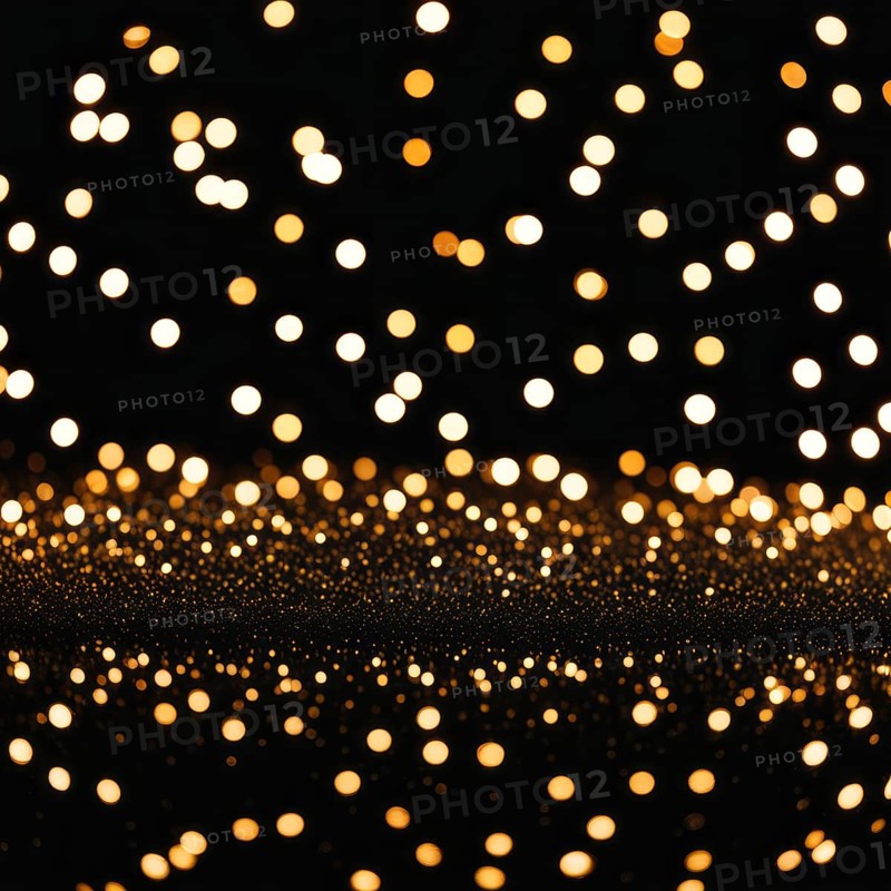 Abstract image of warm-colored lights reflecting to create a bokeh effect with a glowing pattern against a dark background, AI generated