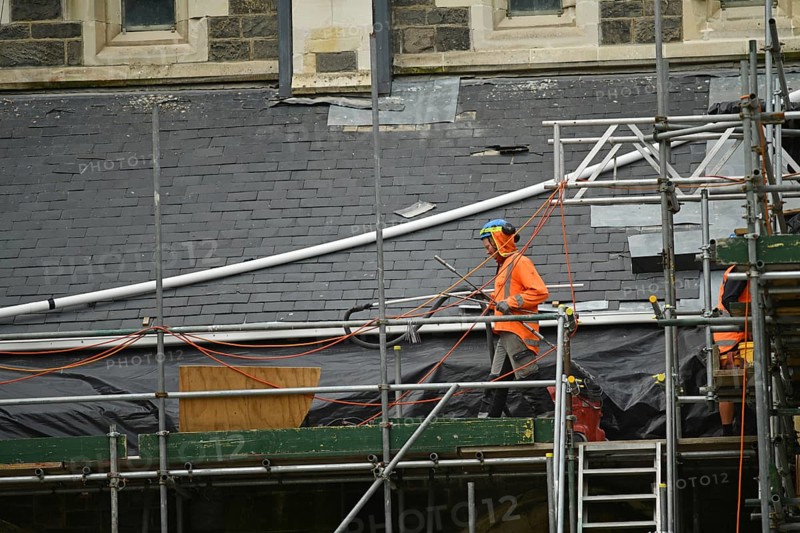 CHRISTCHURCH, NEW ZEALAND, FEBRUARY 24, 2022: A team of tradesmen work on the Anglican Cathedral during the Christchurch rebuild, 11 years after the city was devastated by an earthquake