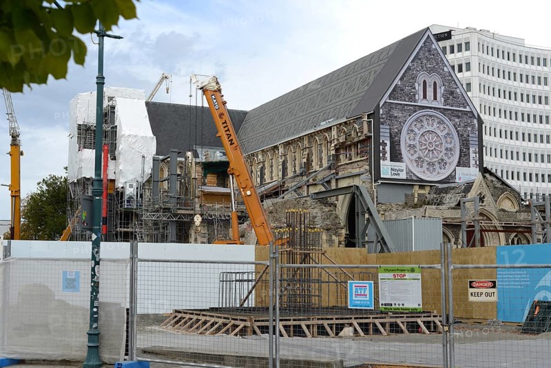 CHRISTCHURCH, NEW ZEALAND, FEBRUARY 24, 2022: A team of tradesmen work on the Anglican Cathedral during the Christchurch rebuild, 11 years after the city was devastated by an earthquake