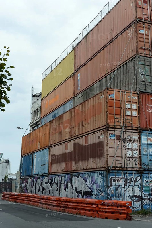 CHRISTCHURCH, NEW ZEALAND, FEBRUARY 24, 2022: Shipping containers continue to stabilise a damaged building, 11 years after the city was devastated by an earthquake