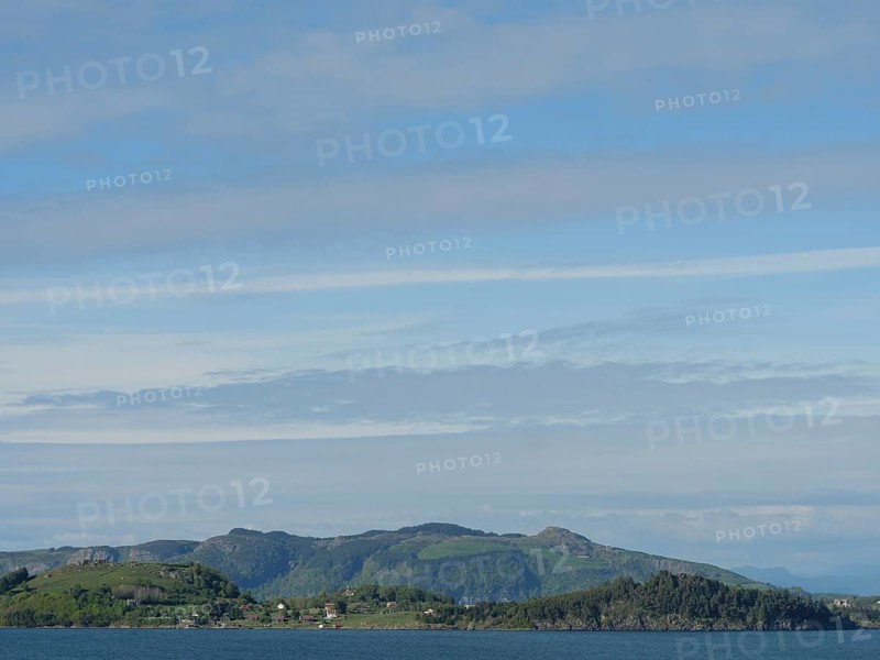 Coastal landscape with a view of the sea and wooded hills in the background, Stavanger, Norway, Europe