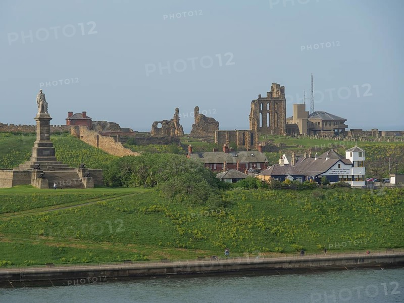 Landscape with historical ruins and a monument on a green hill, Newcastle, England, Great Britain